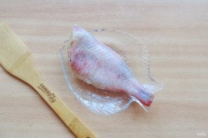 Морской окунь с рисом в духовке