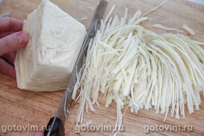 Крученики волынские из свинины с капустой, запеченные в сметане Крученики волынские из свинины с капустой, запеченные в сметане