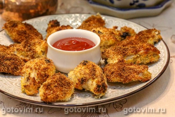 Куриные крылышки, жаренные в кокосовой стружке Куриные крылышки, жаренные в кокосовой стружке