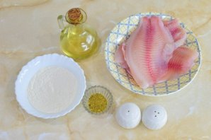 Филе тилапии в муке на сковороде