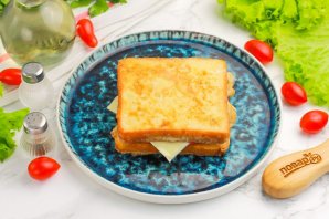 Тосты с ветчиной и сыром Тосты с ветчиной и сыром