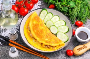 Рис в яичной обёртке "Омурайсу" Рис в яичной обёртке "Омурайсу"