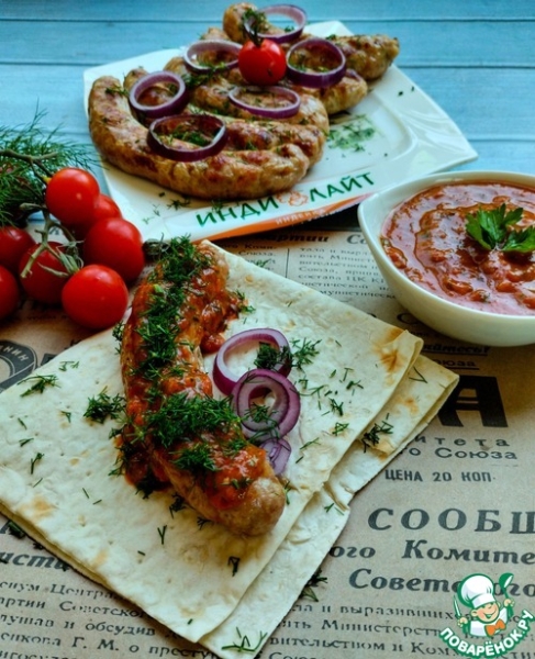 Купаты с соусом из томатов