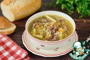 Рассольник с перловкой на утиных головах